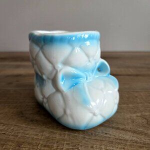 Vintage ceramic baby shoe/boot shape planter/cover pot.